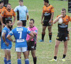 Match referee Matt Navin addressing a Narellan player. Two were sent from the field and one Tigers player sin binned when tempers flared.
