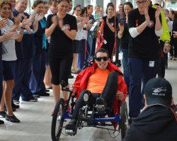 Never give up: Luke Stono is cheered by staff on his arrival at Liverpool Hospital earlier today. Pictures courtesy Liverpool Council.