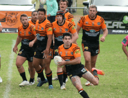 On the burst: The Oaks Tigers attack the Narellan line. Pictures by Nike Shean
