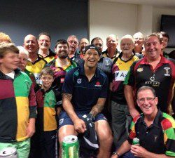 Israel Folau meets players and officials from the Campbelltown Harlequins after the trial match at Campbelltown between Waratahs and the Chiefs earlier this year.