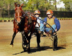 New start: Sean Cunningham’s relationship with harness racing at Tabcorp Park Menangle started in 2008 when young reinsman Robbie Morris, left, drove him around the circuit.