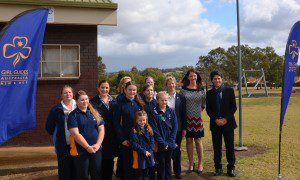 Minister Victor Dominello, right,  Menai MP Melanie Gibbons, second from left at the back, with Girl Guides NSW CEO Peta Gillies, NSW Girl Guides State Commissioner Belinda Allen and leaders of the Girls Guides from Leumeah and Campbelltown outside  Glenfield Girls Guide Hall today.