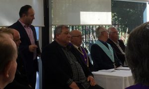 John Tsekas, left, standing, was elected secretary of the Alexander chapter of AHEPA and Lambros Papadopoulos, second from right, president.