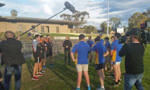 Action: the Footy SHow's Erin Moylan interviews the Warriors players and the Wests Tigers stars.
