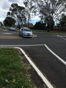 another motorist goes over the island at the Junction Road and Georges River Road roundabout