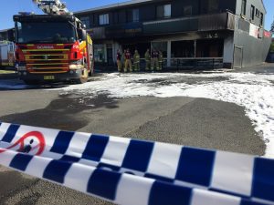 Fire: five people evacuated from their homes upstairs of the Leumeah station shops.