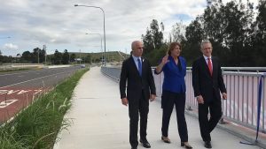 Paul Fletcher, the federal urban infrastructure minister (right), Melinda Pavey, the NSW roads minister, and Chris Patterson, the member for Camden, at Harrington Park earlier today to officially open the 3.3-kilometre section of The Northern Road between The Old Northern Road at Narellan and Peter Brock Drive at Oran Park.