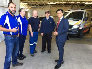Matt Anderson, president south west Sydney Health Services Union, paramedics and fellow union members  Tess Oxley, Stuart Peterson and Greg Morley discuss the issue with MP Anoulack Chanthivong at Macquarie Fields Station yesterday.