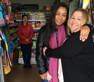 OCAGI founder Polly Grundy with medical researcher Prapti Shestra and her mother Bina in the family’s Himalayan store in Ingleburn.