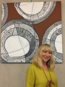 artist Julie Hickson with her favourite work, Odyssey/Macadamia, during the launch of her exhibition in the Australian PlantBank at the Mt Annan Botanic Garden.