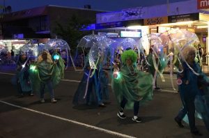 The annual festival parade brings residents to the main street once a year