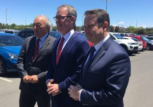 Dr Mike Freelander, opposition leader Michael Daley and local MP Greg Warren in the commuter carpark at Campbelltown station earlier today.