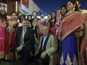 Colour and movement: Mayor Ned Mannoun at the back, with MP Craig Hughes and Councillor Mazhar Hadid at front.