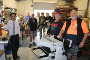 MP Anoulack Chanthivong at the Macquarie Fields men's shed, which received funding under the community building partnership program