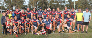 Camden Rams first grade team celebrate their win over the Thirlmere Roosters on Sunday. 