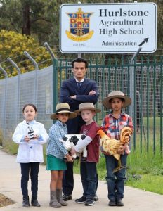 It's not right: MP Anoulack Chanthivong with local youngsters sending a message to the Baird Government to not sell the Farm at Hurlstone.