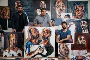 Arts centre director Michael Dagostino, Sydney Festival director Wesley Enoch and artist Ben Quilty surrounded by Myuran Sukumaran works.