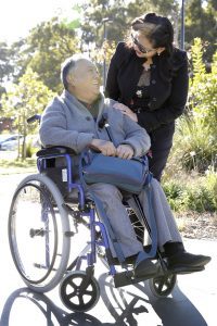 Angie Dali with her father Chan Shem Lau, who is one of the beneficiaries of the new service.