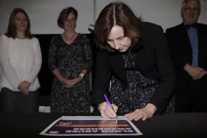 Amanda Larkin, the Health District’s chief executive signing the statement of commitment that includes the NSW Police Force, Aged Care, Multicultural Health, Aboriginal Health and the National LGBTI Health Alliance Silver Rainbow.