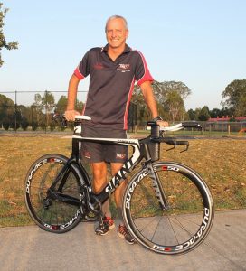 Honour: South West Sydney Academy of Sport triathlon head coach Guy Creber’s enthusiasm and commitment to developing the very best in his athletes has been recognised at this year’s Australia Day awards in Camden.