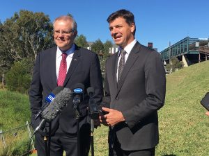 federal treasurer Scott Morrison with MP Angus Taylor at Macarthur station this morning.