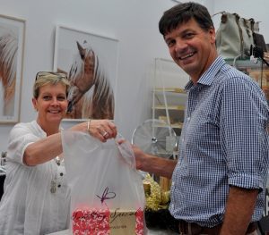 MP Angus Taylor, pictured here with small business owner Janarie Micallef
