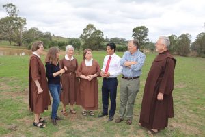 Have your say by this Friday to help stop cemetery plan at Scenic Hills, says MP Anoulack Chanthivong, pictured here with cemetery opponents Jacqui Kirkby, Father Paul and Carmelite nuns.