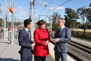Labor MPs Anoulack Chanthivong, Anne Stanley and NSW state opposition deputy leader Michael Daley at Glenfield railway station.