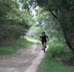 Cr Meg Oates wants council to consider creating a bush cycling track along the Georges River