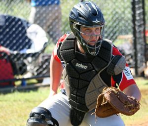  Softball catcher Corey Gleason, in action from the weekend, is one of the South West Sydney Academy of Sport athletes who will benefit from the ClubsNSW education funding.