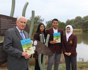 Eric the Eel book inspires educational signs at pond.