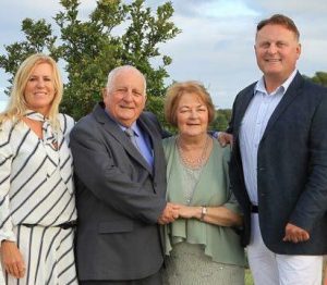 Jamie McLaughlin, right, with his wife, Georgie and his parents, John and Jan.