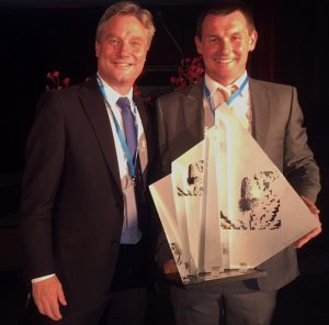 Invasive Animals CRC CEO Andreas Glanznig (left) with Feral Scan program manager, Peter West, receiving the Minister’s award for a Cleaner Environment in the field of Research and Science excellence, sponsored by the Australian Government Department of Environment and Energy at the Banksia Foundation 2016 Awards.