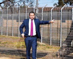 MP Greg Warren says wire fences between Briar Road Publoic School and Reiby Juvenile Justice Centre doesn't cut it.