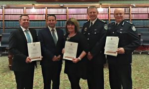 Greg Warren with volunteer award recipients from left, Stephen Cantrill and Sandra McDonald, with Paul Norton and Andrew Macdonald representing NSW Rural Fire Service Macarthur.