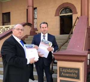 Greg Warren, right, and Walt Secord with the health petition