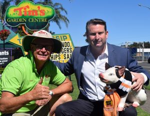 Tim Pickles, Greg Warren and Pig wrapped in Wests Tigers colours.
