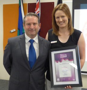 Greg Warren with his choice of 2018 Campbelltown woman of the year, international hockey umpire Kylie Seymour.