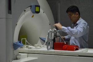 A researcher using the MRI scanner in the Ingham Institute bunker.