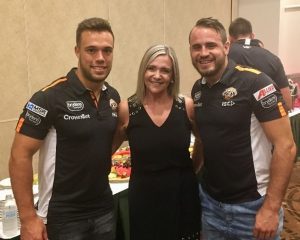 Ms Scobie with the new Wests Tigers halves pairing, Luke Brooks and Josh Reynolds.