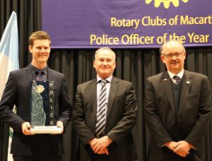 Police officer of the year Senior Constable David Blom receives his award from NSW Assistant Police Commissioner Peter Thurtell and Rotary immediate past district governor Stephen Britten           