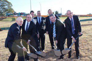 Team work: Local members Bryan Doyle, Jai Rowell, Russell Matheson and Chris Patterson turn the first sod at Narellan Roafd as Mike Baird, Joe Hockey and Tony Abbott watch on.