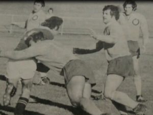Ray Corkery about to lend a hand in a tackle