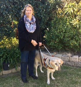 Rhonda McCaw and her guide dog, Shelly.