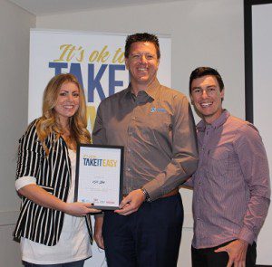 Lyndal Rogers and Josh Webster of C91.3FM accept a media partner certificate from Youth Solutions President Peter Campbell (centre) in honour of their support of this year’s Take it Easy campaign.