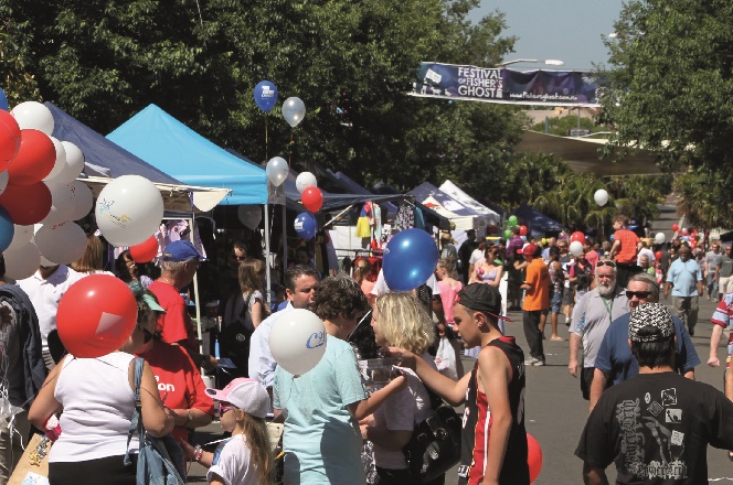 Double the excitement: street fair and parade on the same day