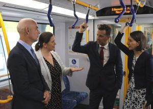 Chris Patterson and Melanie Gibbons, NSW transport and infrastructure minister Andrew Constance and Premier Gladys Berejiklian check out the train services along the South West Rail Link.