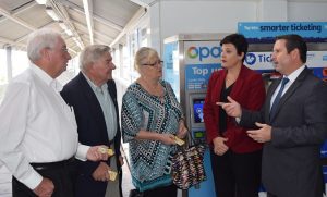 Greg Warren, right, with Labor transport spokesperson Jodi McKay and commuters at Campbelltown station.
