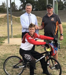Tony Mathew, CEO Wests Group Macarthur and Fred Furner, president of Macarthur BMX Club and his son, Jai.