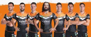 Aaron Woods, centre, with the members of the new leadership team at Wests Tigers.